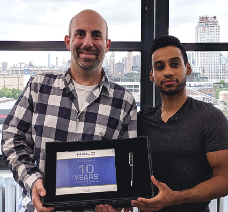Service award presentation for employee milestone