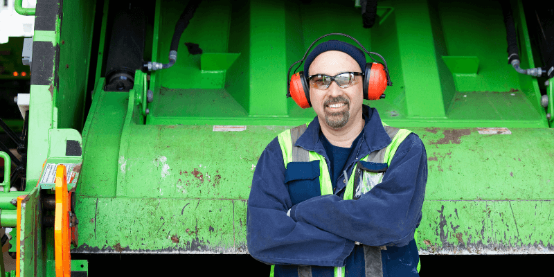 Sanitation worker standing in extreme heat
